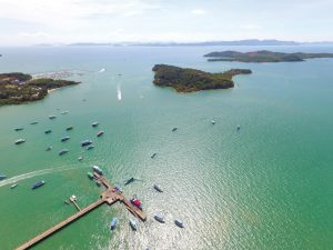 The jetty at Ao Po, with (top left) Ao Po Grand Marina & (right) first Koh Raet, then Koh Naka Yai - Image courtesy of Lee Marine International Marine Brokerage. Photographer: Jim Poulsen