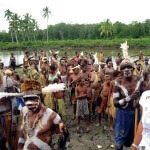 Asmat greet visitors