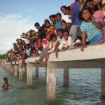 Indonesian kids on a jetty