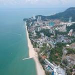 Drone shot of the long beach at Batu Ferringhi