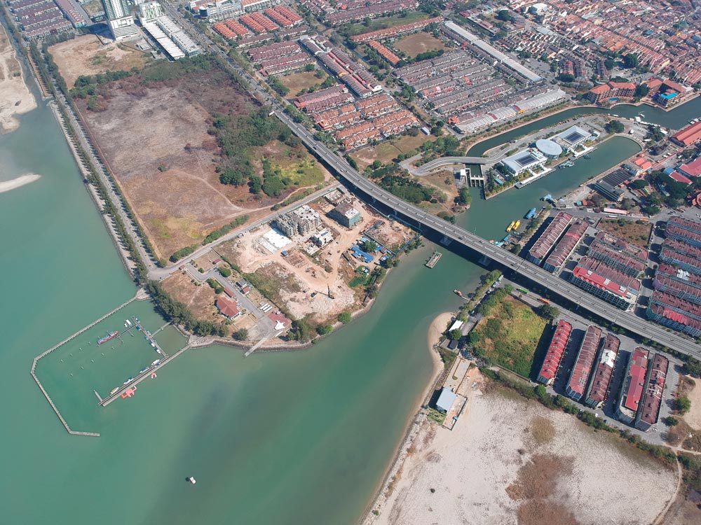 Drone shot of Malacca Marina, bridge & river entrance