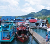 Busy pier with lots of shops at Ao Bang Bao on Koh Chang