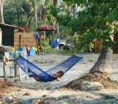 Kid asleep in a hammock on Koh Mak
