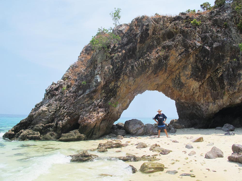 Koh Chuku's archway is a favourite photo opportunity for day-trippers
